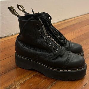 Sinclair Dr. Marten leather platform boots.